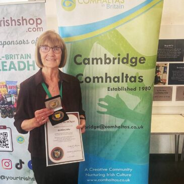 Kathleen Collins receives a Gradam Award from Comhaltas